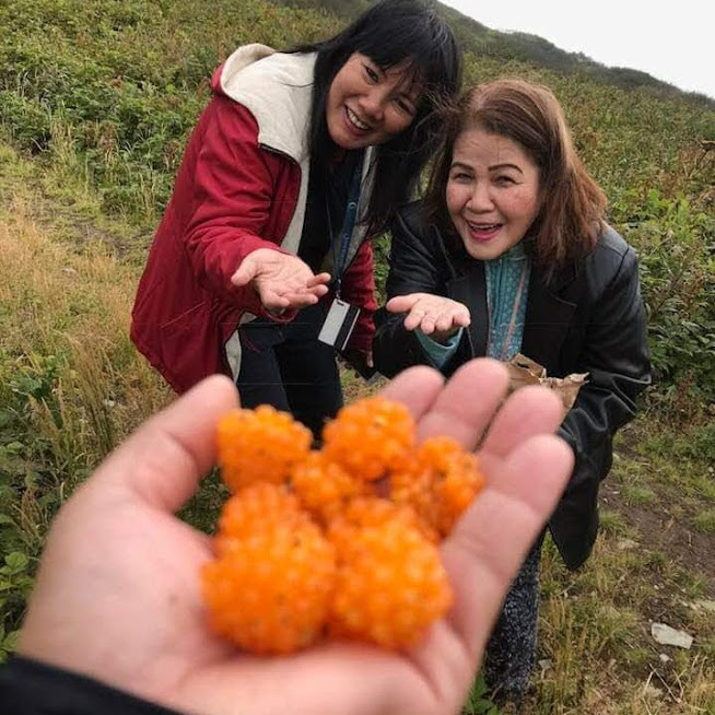 Feyma loves these "Salmon Berries" that they pick in Alaska.